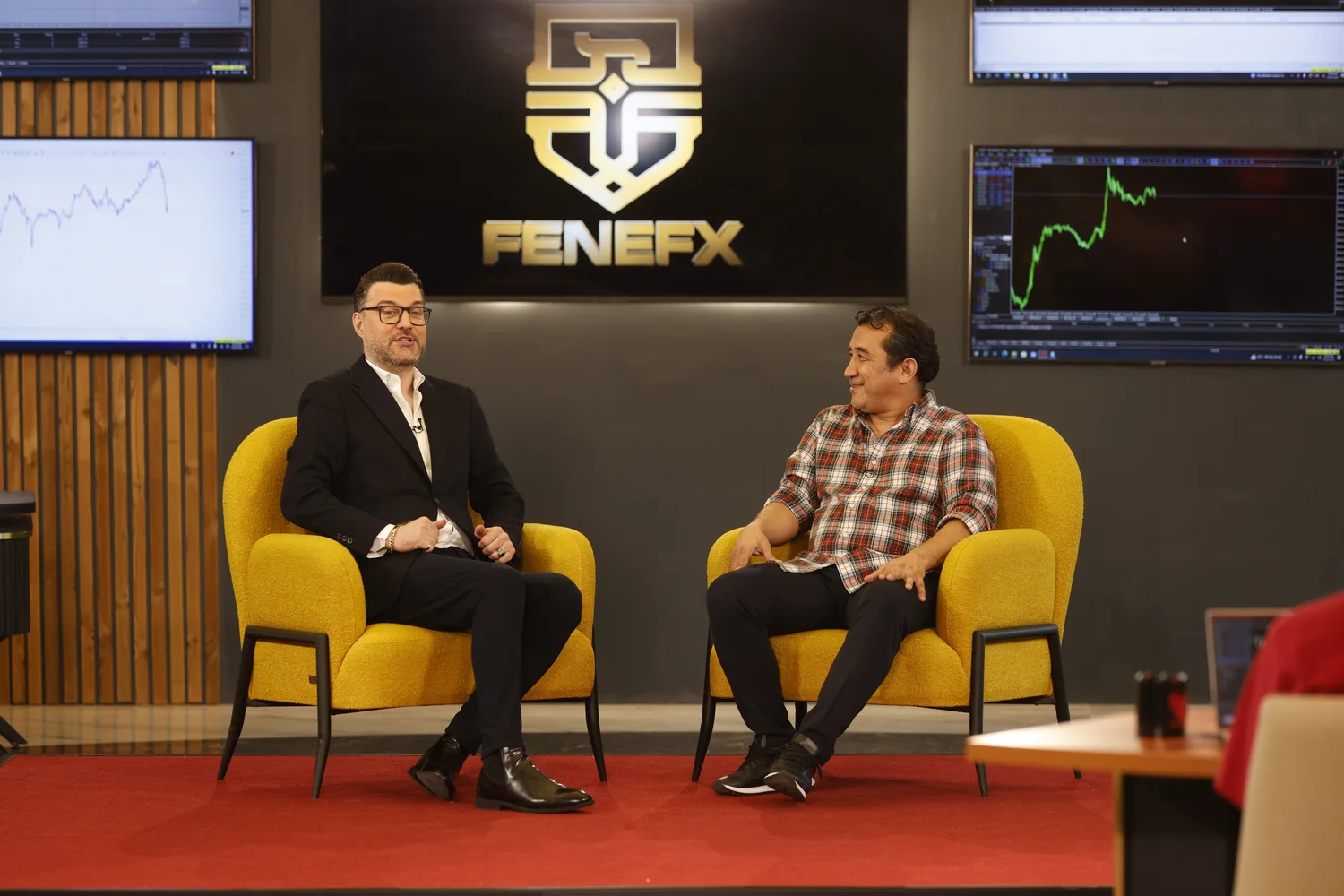 The House of Traders interview set under the FeneFX logo